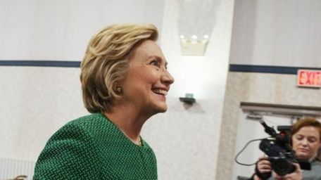 Democratic presidential candidate Hillary Clinton exits after speaking