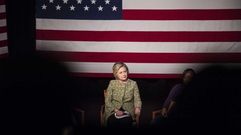 Democratic presidential candidate Hillary Clinton holds a conversation