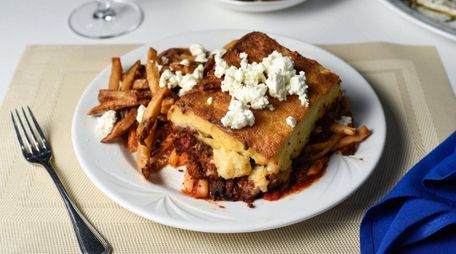 Moussaka, made with zucchini, eggplant, and ground beef,