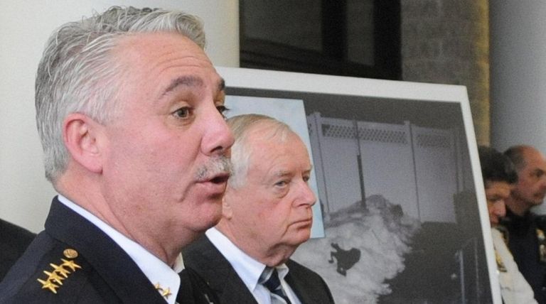 Former Suffolk County Police Chief James Burke, left,