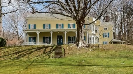 This historic three-story house in Cold Spring Harbor