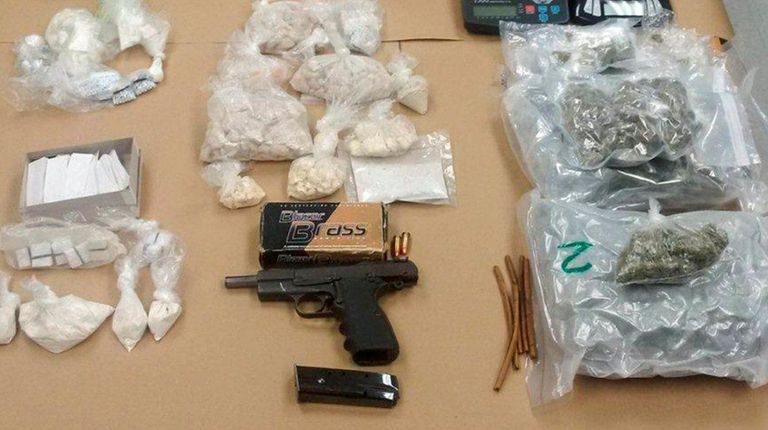 Drugs, cash and a handgun were seized after