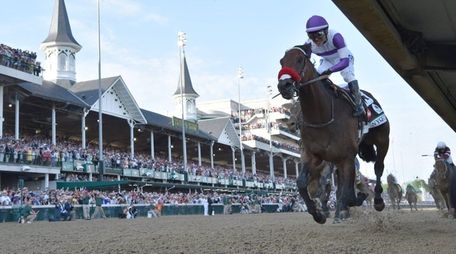Mario Gutierrez rides Nyquist to victory during the