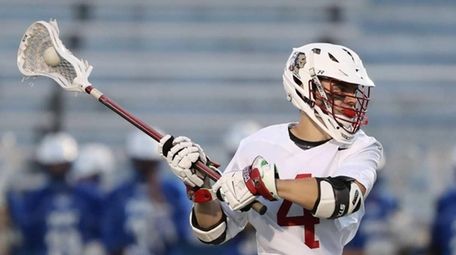 Syosset's Matthew Farrell #4 splits through the defenders