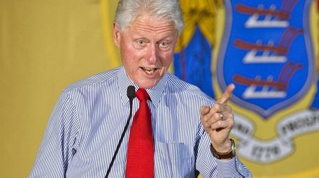 Former President Bill Clinton campaigns for his wife