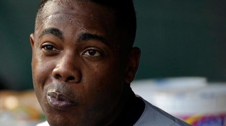 New York Yankees relief pitcher Aroldis Chapman sits