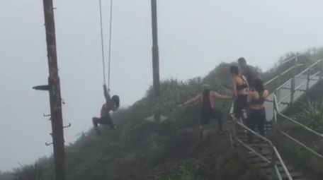 A woman nearly fell to her death while