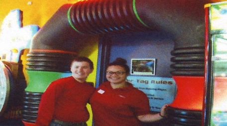 Kidsday reporter Jason Koabel, left, with employee Jennifer