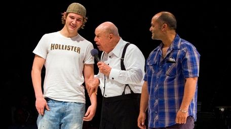 Comedian Don Rickles chastises two young guys from