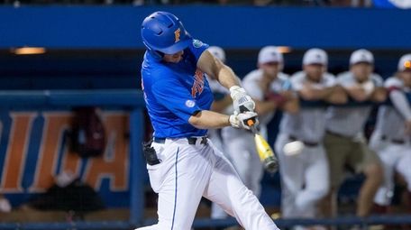 Florida first baseman Peter Alonso connects for a