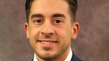 New SUNY Ulster baseball coach Steven Morse poses