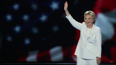 Democratic presidential nominee Hillary Clinton waves to the