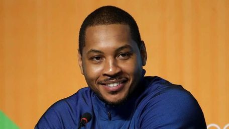 Carmelo Anthony of the United States speaks with