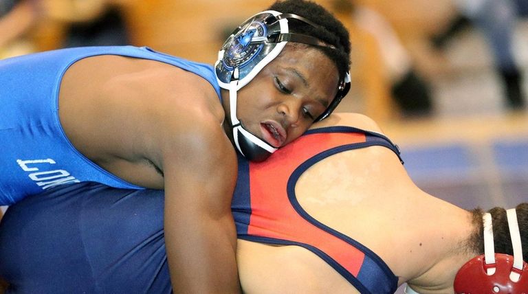Long Beach's Jacon Teemer competes in his 132-pound