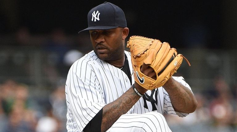 New York Yankees starting pitcher CC Sabathia delivers
