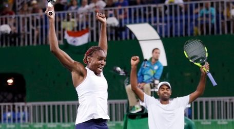 Venus Williams, left, and her partner Rajeev Ram,