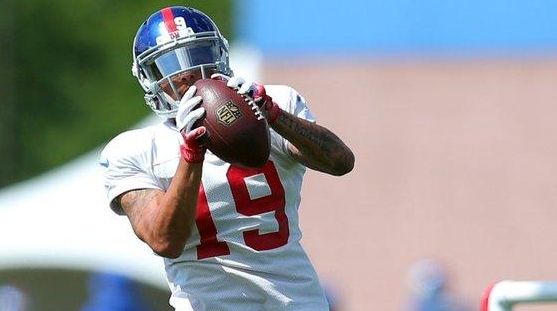 Giants wide receiver Myles White catches a pass