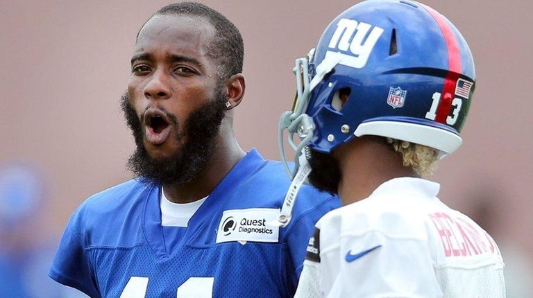 Giants cornerback Dominique Rodgers-Cromartie talks to Odell Beckham