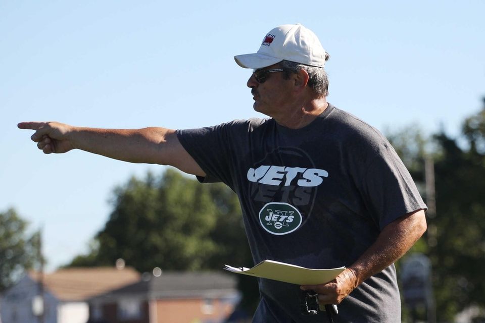 Coach Frank Limanni gives instructions during practice at