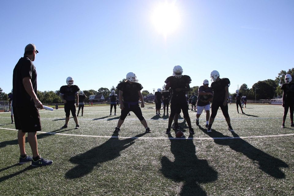 Players do drills during practice at Sewanhaka High