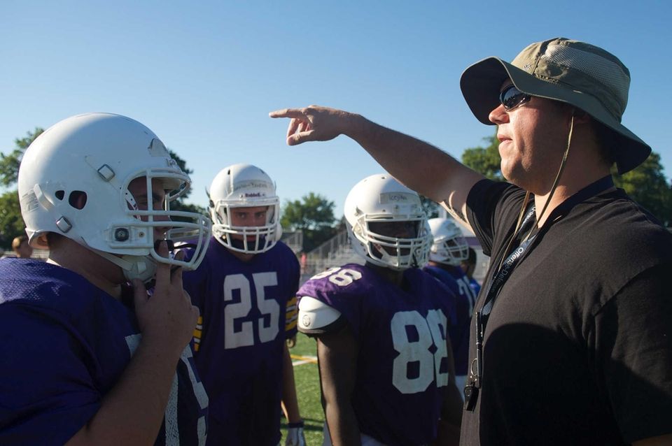 Coach Nick Rawls gives instructions during practice at