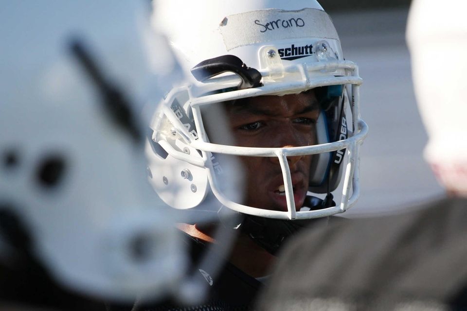 Xavier Serrano looks on during practice at Sewanhaka