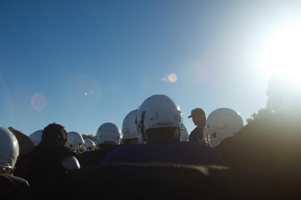 Head coach George Kasimatis gives instructions before practice