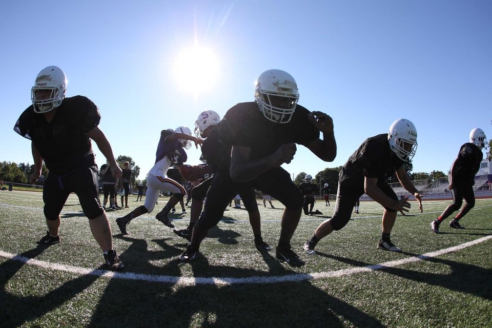 Players do drills during practice at Sewanhaka High