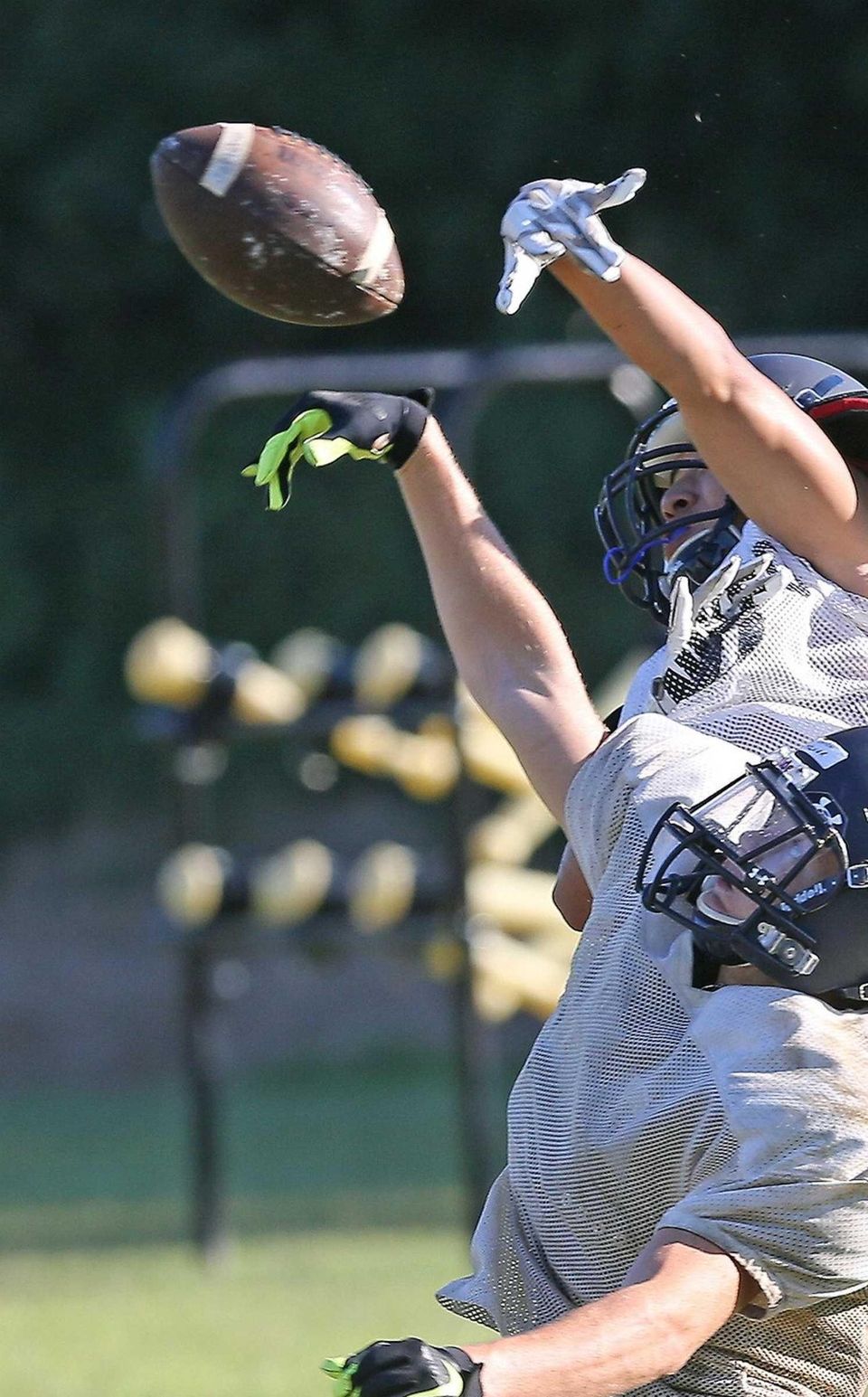Ball knocked away at Jericho football practice at