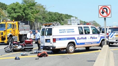 A motorcyclist and a police vehicle collided Wednesday