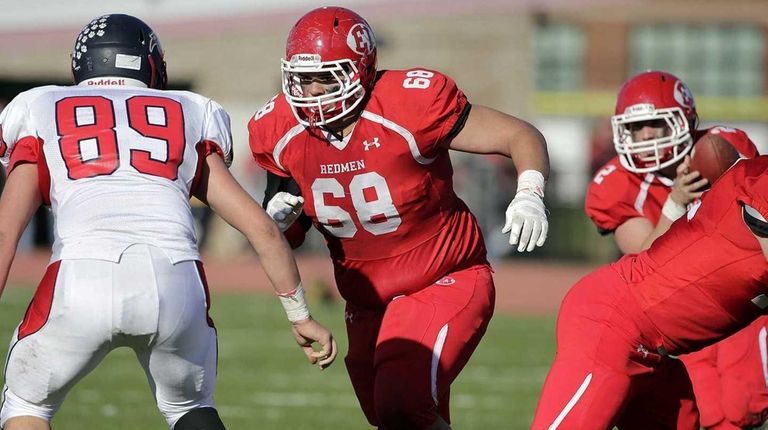 East Islip lineman Kyle Nunez blocks for quarterback