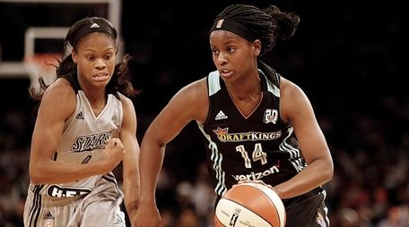 Sugar Rodgers of the Liberty drives against San