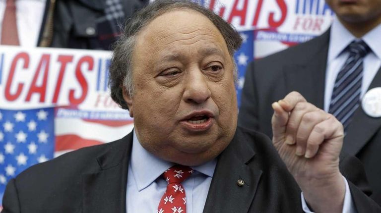 John Catsimatidis talks to the media during a