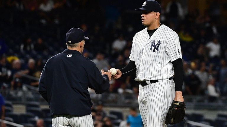 A rare sight: Yankees manager Joe Girardi, left,