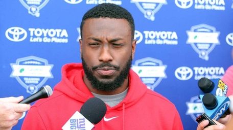 Giants safety Nat Berhe speaks during training