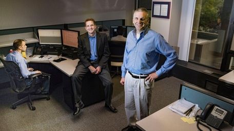 LBi Software president Richard Teed, right, and vice