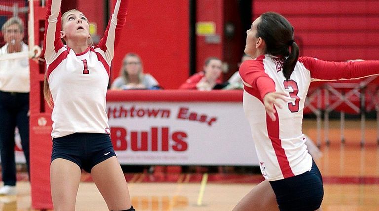 Smithtown East's Brooke Berroyer (1) sets the ball