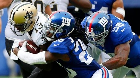 Janoris Jenkins of the New York Giants tackles