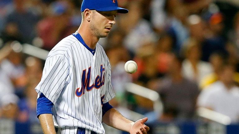 Jerry Blevins of the Mets reacts after surrendering