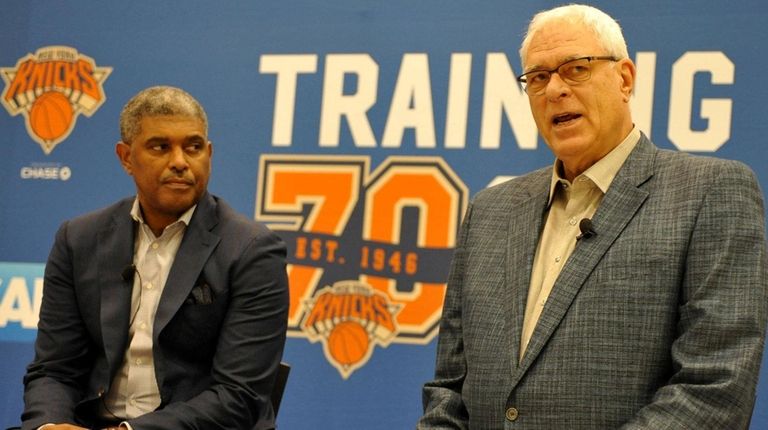 Phil Jackson, Knicks president, right, alongside general manager