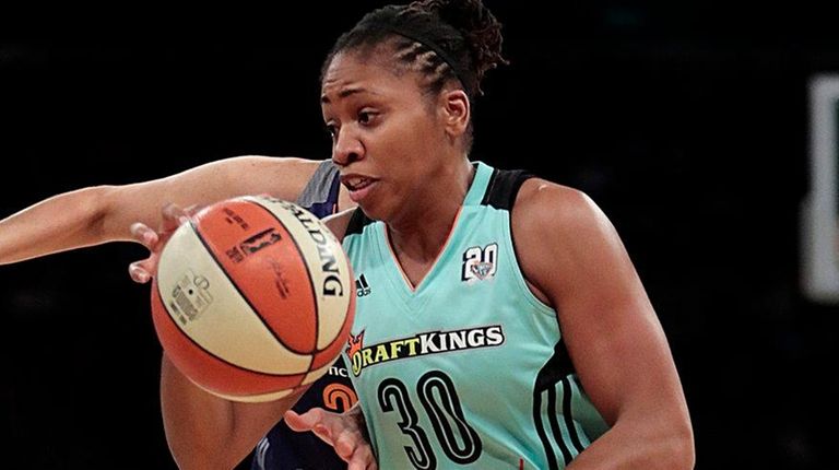 New York Liberty guard Tanisha Wright drives the