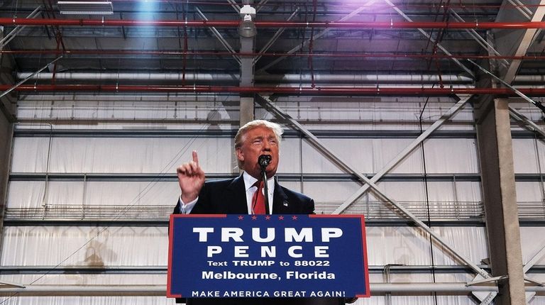 Donald Trump speaks at a Florida airport hanger