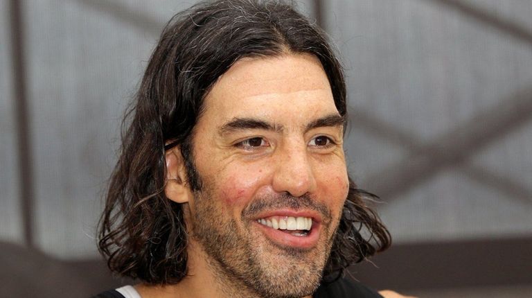 Nets' Luis Scola talks to media at Nets
