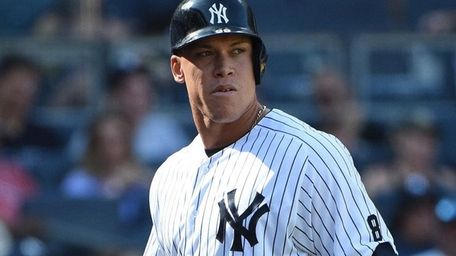 New York Yankees' Aaron Judge looks on against