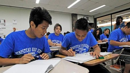 From left, Irvir Reyes, Axel Sanchez and classmates
