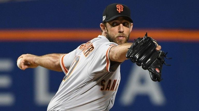 San Francisco Giants' Madison Bumgarner delivers a pitch