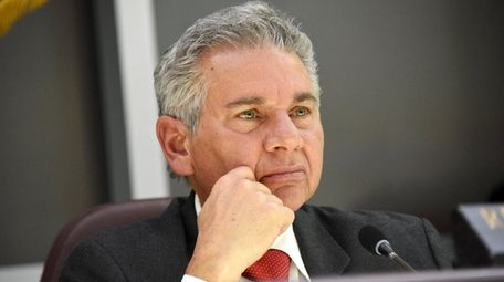 Glen Cove Mayor Reginald Spinello listens to speakers