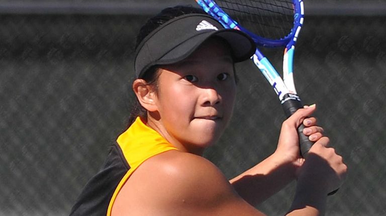 Kimberly Liao of Commack returns a shot from