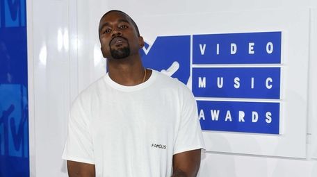 Kanye West posing at the MTV Video Music