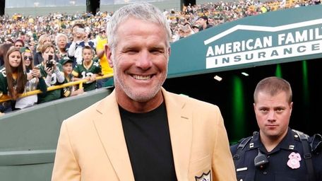 Former Green Bay Packers' Brett Favre smiles as